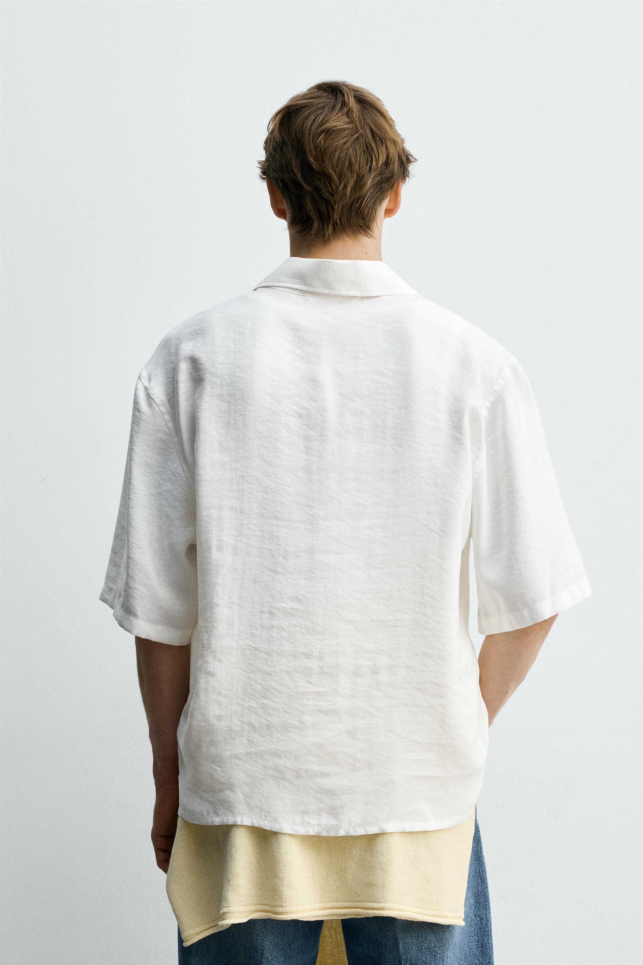 CHEMISE POLO FLUIDE À SURPIQÛRES